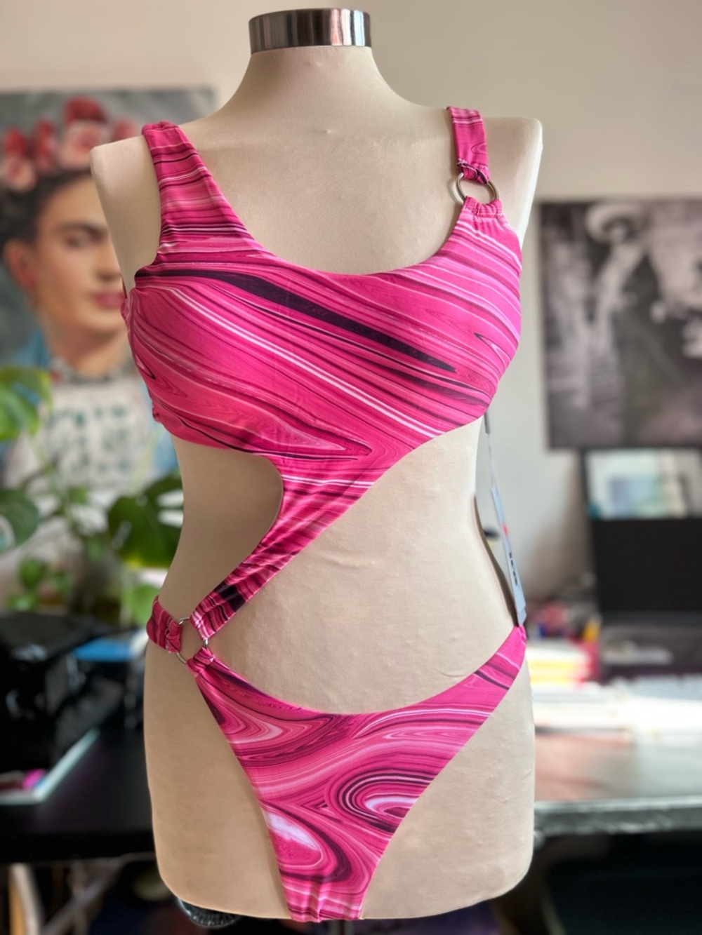 Yira pink one piece with circle  details size large